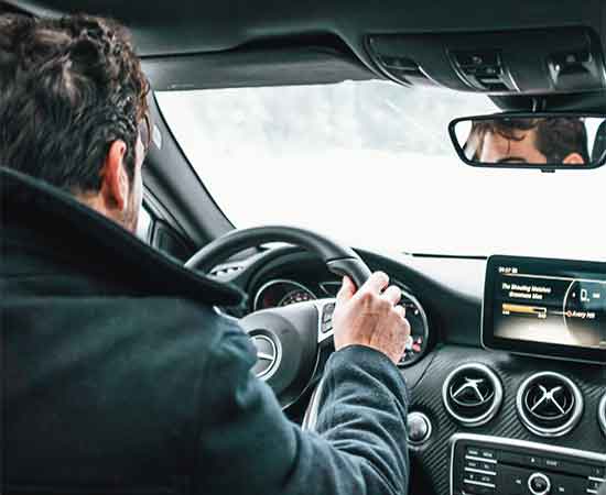 Man in our car during his car instruction lesson for drive test Windsor