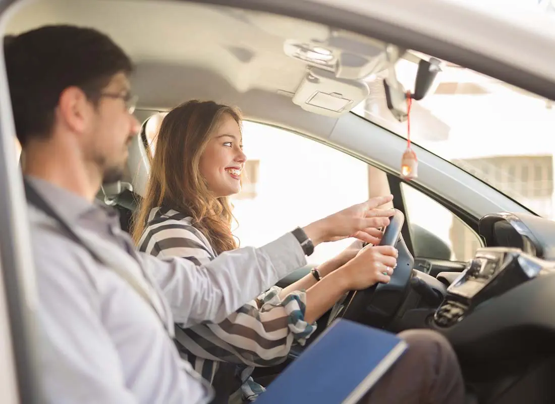 Happy Teen taking Driving Lessons in Windsor