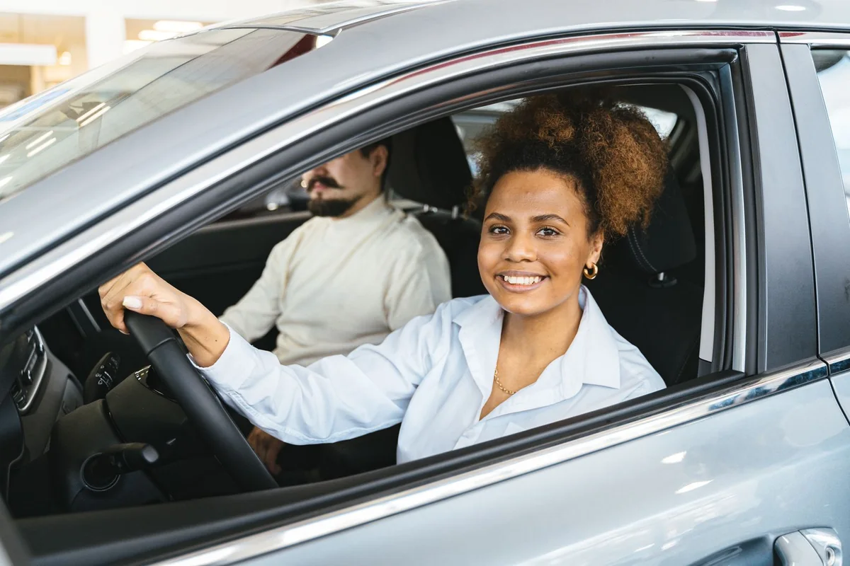 A new driver smiling confidently after passing the G1 test